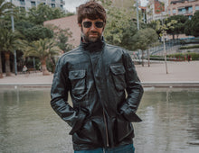 Detailed shot of the zipper and hardware accents on the Hunter Black Leather Jacket, adding a rugged touch.