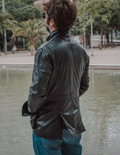 Front closure detail of the Hunter Jacket, featuring a sturdy zipper and button accents for added style.