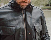 Model wearing the Hunter Black Leather Jacket, showcasing its versatility and timeless style
