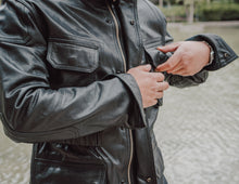 Back view of the Black Leather Jacket Coat, featuring a stylish yet timeless silhouette