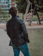 Side pocket detail of the Hunter Black Leather Jacket, demonstrating its practicality and convenience.