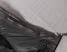 inside pocket of leather vest