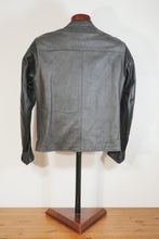 Full back view of café racer leather jacket on stand