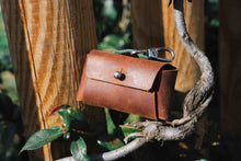 Handcrafted Leather Dog Poop Bag Holder – Premium brown leather waste bag dispenser with metal clip, perfect for stylish pet owners.