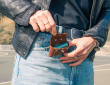 Handcrafted Leather Poop Bag Holder for Dogs – Open view showing eco-friendly waste bags inside, designed for convenience and durability.