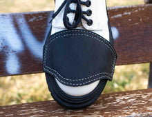 Handcrafted black leather shifter boot protector on white motorcycle boots – Fashion Racing
