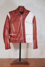 Two-tone leather jacket in red and white with multiple zip pockets on mannequin
