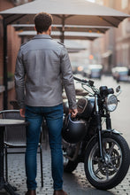 Model wearing gray leather shirt jacket back view