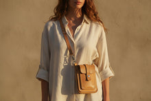 women wearing yellow leather crossbody bag handcrafted by FashionRacing.com