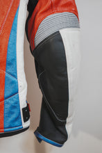 Detailed sleeve design of red and black motorcycle jacket
