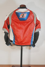 Back view of red white blue leather motorcycle jacket on mannequin