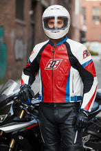 Rider in helmet wearing leather racing jacket on street