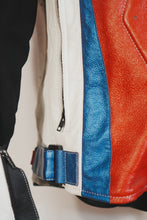Side pocket and waist adjustment straps on red blue white biker jacket