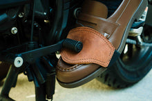 Brown leather motorcycle shifter boot protector on men's loafer while shifting gear – Fashion Racing