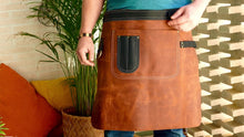 Handmade leather apron in use by a professional chef, bartender, or barista, showcasing its functionality and stylish design. Perfect for restaurants, cafes, or workshops, this custom leather apron is made from high-quality, durable leather for daily work.