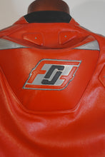 Close-up of Fashion Racing logo on red leather motorcycle jacket back