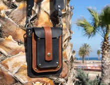 Black, brown leather phone bag with wide crossbody strap