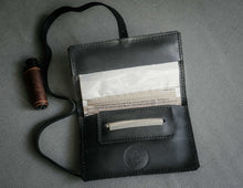 black leather tobacco pouch