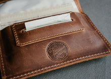brown tobacco pouch