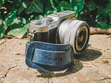 Blue leather camera hand strap for Fujifilm camera, personalized with engraved name