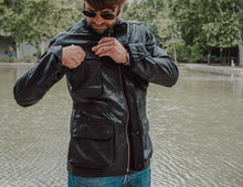 Front view of the Hunter Black Leather Jacket for Men, showcasing its sleek design and modern appeal.