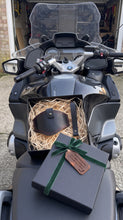 Motorcycle Boot Protector gift box with handcrafted leather gear shift protector, designed to protect motorcycle boots from gear shift wear, displayed on a BMW motorcycle.