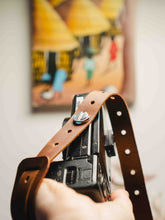 Brown leather camera hand strap for photographers, handmade camera grip accessory