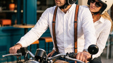 Reinforced brown leather suspenders with trigger snaps, front view