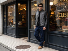 Classic men’s leather biker jacket in black and grey cafe racer design.