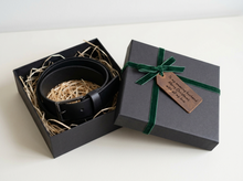 Black full-grain leather belt presented in a gift box with gift message
