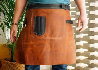Premium brown leather half apron with a large leather pocket, crafted from genuine leather. Ideal for chefs, baristas, bartenders, or workers, BBQ, Chef, Blacksmith, Tattoo Artist, Restauran, Florist 