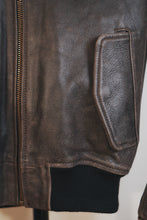 Brown leather bomber jacket pocket detail – handmade