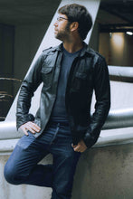 Close-up of leather shirt jacket pocket and buttons