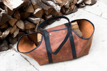 Image of a meticulously crafted leather bag designed for carrying firewood, showcasing durability and style.