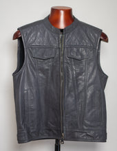 Grey leather vest on a mannequin against a white background