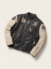 Men’s leather cafe racer jacket with black body, cream sleeves and motorcycle patches.
