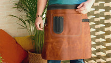 Handmade leather apron in use by a professional chef, bartender, or barista, showcasing its functionality and stylish design. Perfect for restaurants, cafes, or workshops, this custom leather apron is made from high-quality, durable leather for daily work.