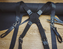black leather camera harness