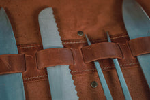 brown leather knife roll
