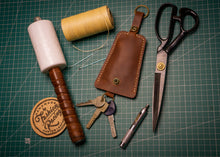 keychain in brown leather, waxed thread, handmade leather work