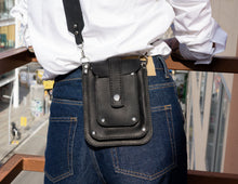 Vertical crossbody bag in genuine black leather wide long strap